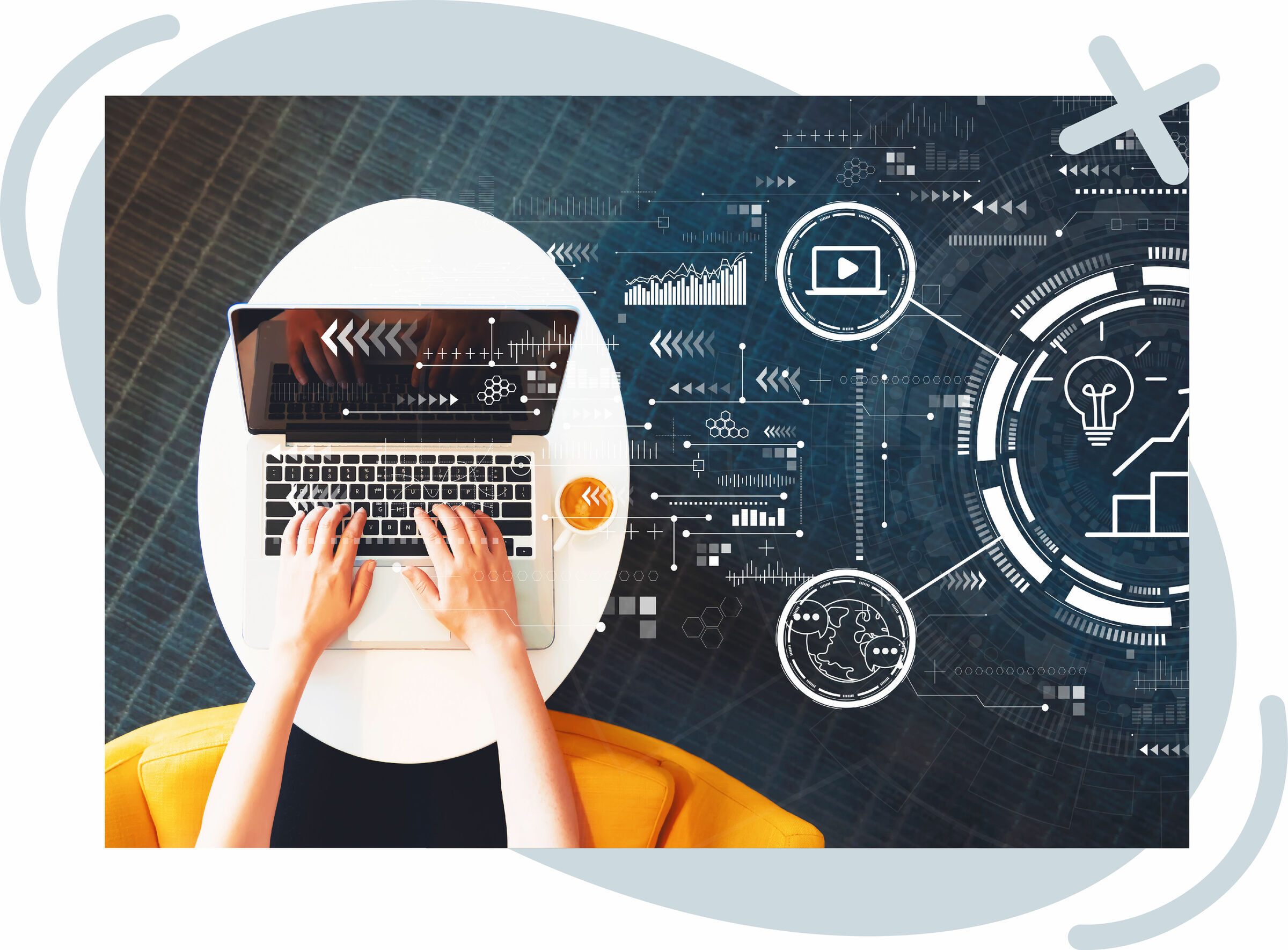 Top-down view of hands typing on a laptop at a small white round table with a cup of tea, overlaid with futuristic UI graphics like charts, arrows, a play icon, globe, and lightbulb suggesting data, media, and innovation concepts.