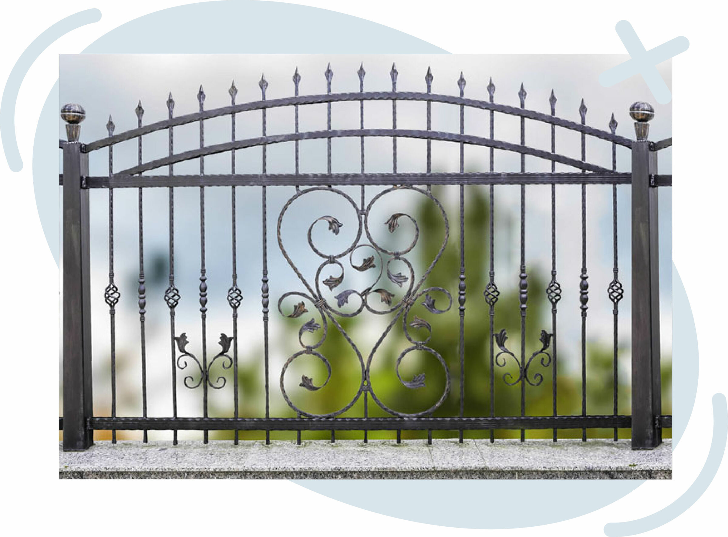 Decorative wrought iron gate with ornate scrollwork and spearhead finials against a soft, blurred outdoor background.