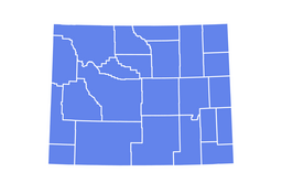 Simplified map of a U.S. state with internal county boundaries shown in white on a solid blue state silhouette.