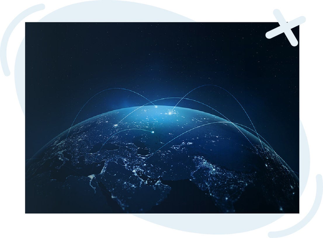 View of Earth from space at night with glowing city lights and curved lines representing global data connections.