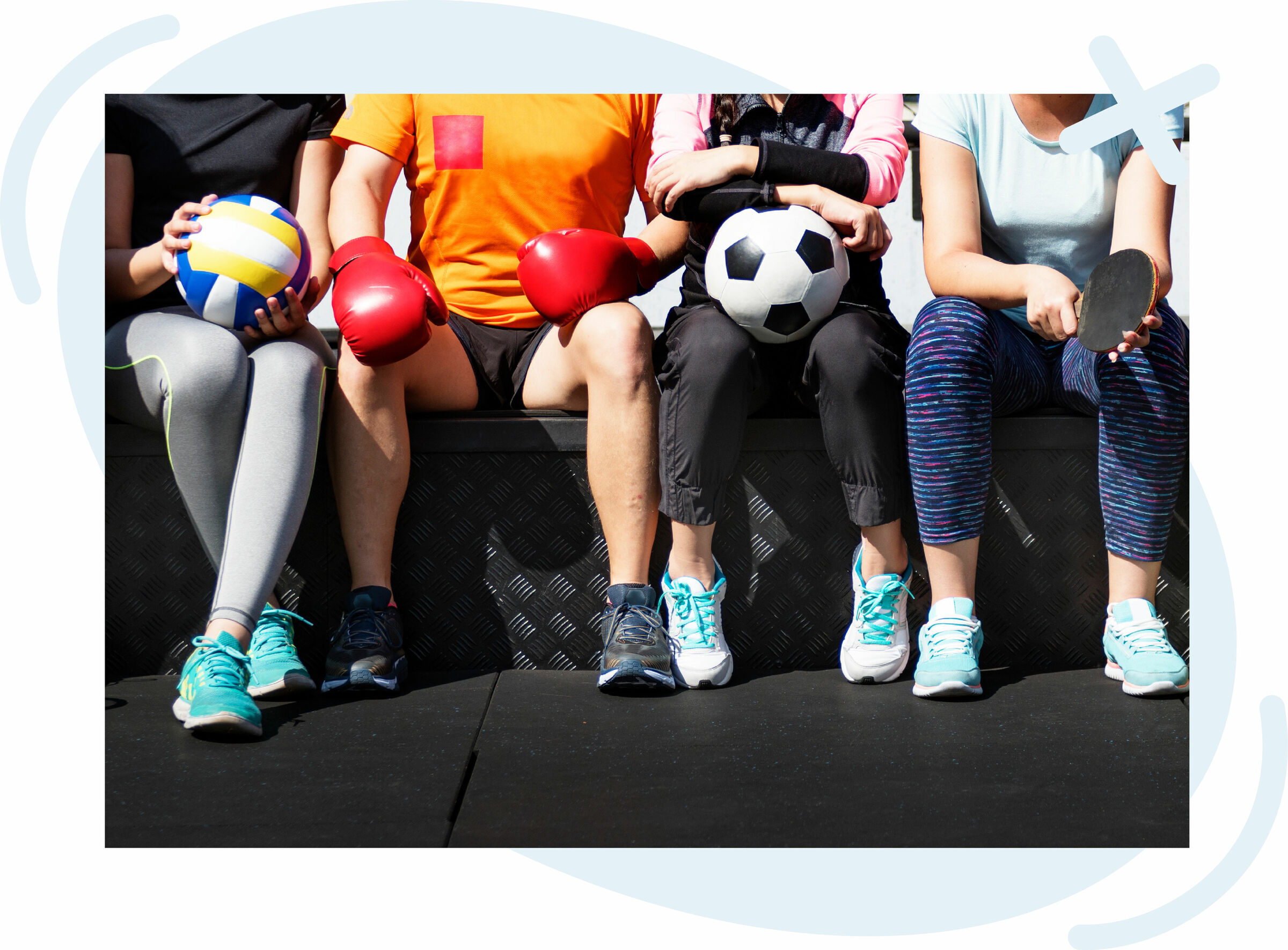 Row of people sitting on a bench, each holding different sports gear like a volleyball, boxing gloves, a soccer ball, and a ping-pong paddle, showing only their torsos and legs.
