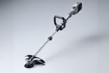 Cordless electric string trimmer on a light gray studio background