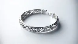 Elegant silver filigree bracelet on a light gray background